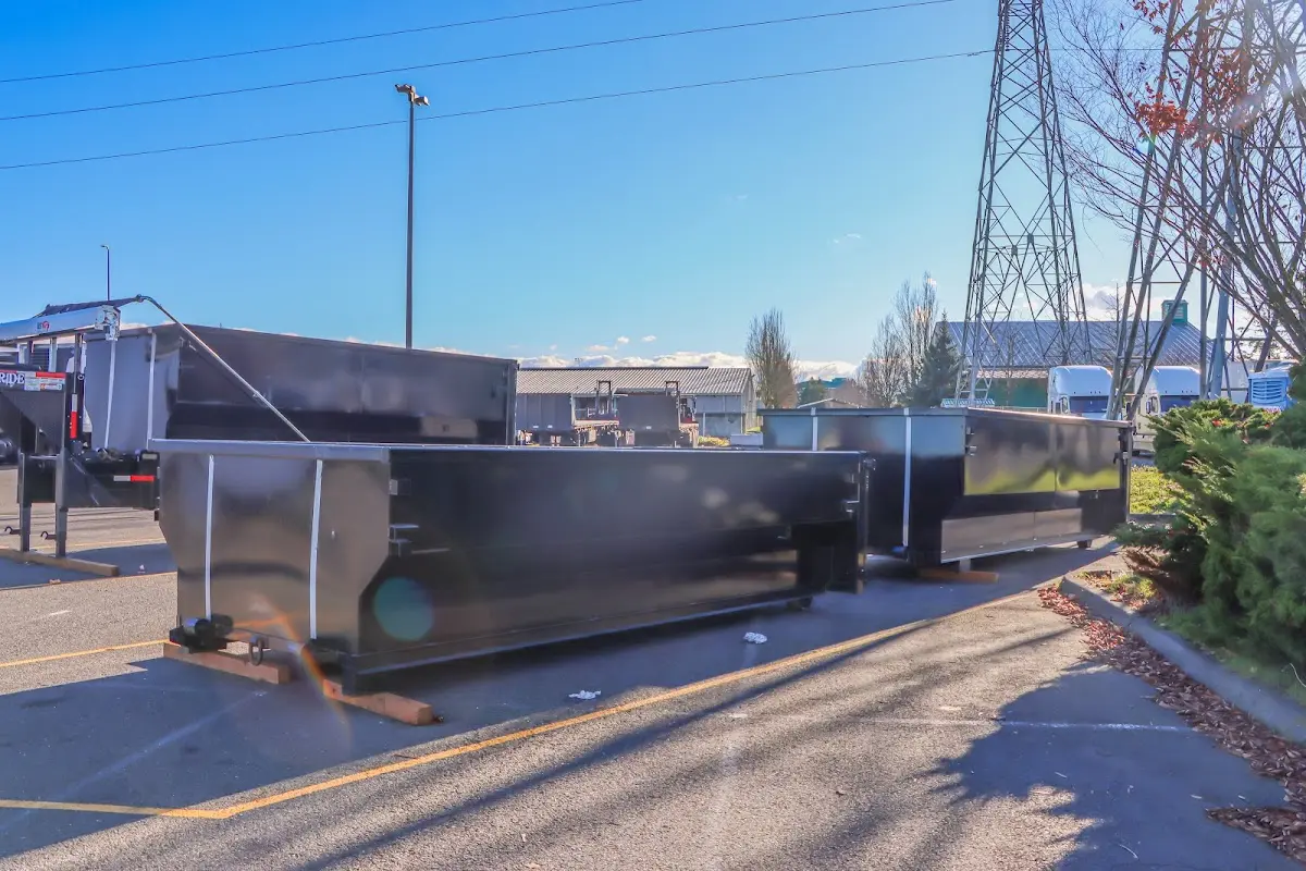 Roll-off dumpster ready for waste disposal at job site for 6 Yard Dumpster Rental in Darien